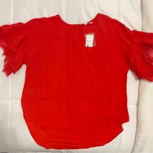 Beautiful Red Polyester blouse. New with Tags size medium